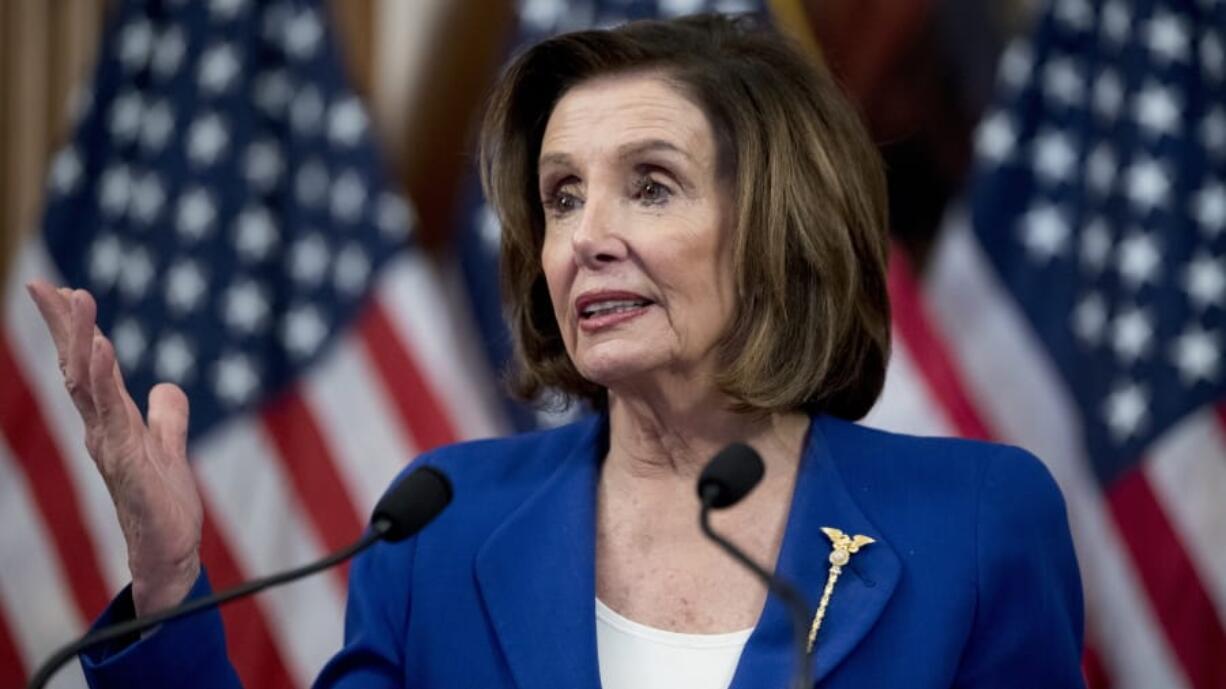 House Speaker Nancy Pelosi of Calif. speaks before she signs the Coronavirus Aid, Relief, and Economic Security (CARES) Act after it passes in the House on Capitol Hill, Friday, March 27, 2020, in Washington. .