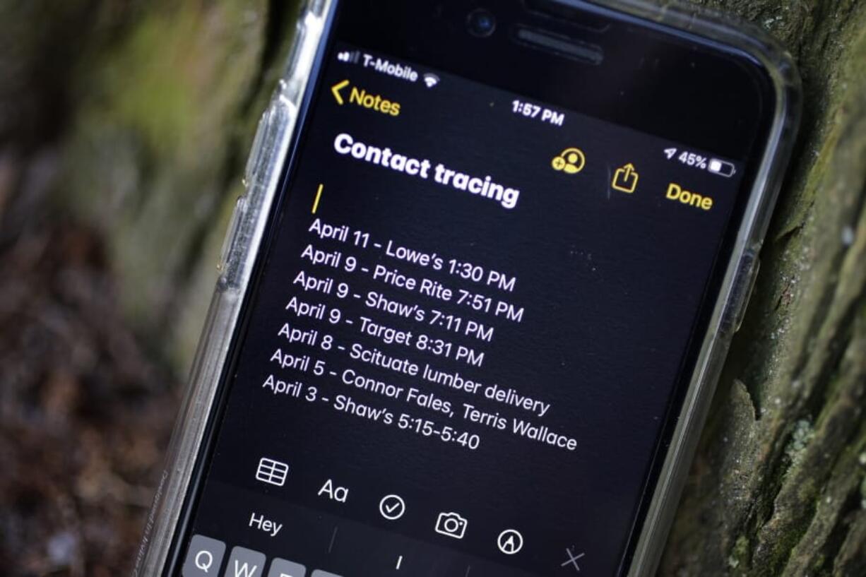 A smartphone belonging to Drew Grande, 40, of Cranston, R.I., shows notes he made for contact tracing Wednesday, April 15, 2020. Grande began keeping a log on his phone at the beginning of April, after he heard Rhode Island Gov. Gina Raimondo urge residents to start out of concern about the spread of the coronavirus.