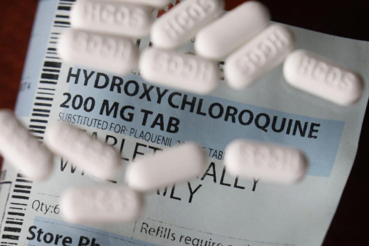 FILE - This Monday, April 6, 2020, file photo shows an arrangement of Hydroxychloroquine pills in Las Vegas. At least 13 states have obtained a total of more than 10 million doses of malaria drugs to treat COVID-19 patients despite warnings from doctors that more tests are needed before the medications that President Trump once fiercely promoted should be used to help people with the coronavirus.