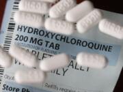 FILE - This Monday, April 6, 2020, file photo shows an arrangement of Hydroxychloroquine pills in Las Vegas. At least 13 states have obtained a total of more than 10 million doses of malaria drugs to treat COVID-19 patients despite warnings from doctors that more tests are needed before the medications that President Trump once fiercely promoted should be used to help people with the coronavirus.