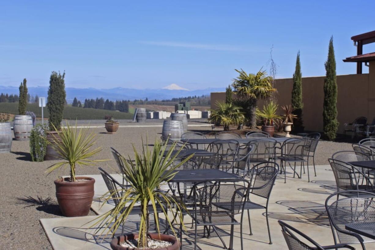 In this photo taken Tuesday, April 14, 2020, the patio at Coria Estates, a winery on the outskirts of Salem, Ore,, is devoid of customers because of the governor&#039;s stay-at-home order. Oregon is in its fourth week of lockdown.