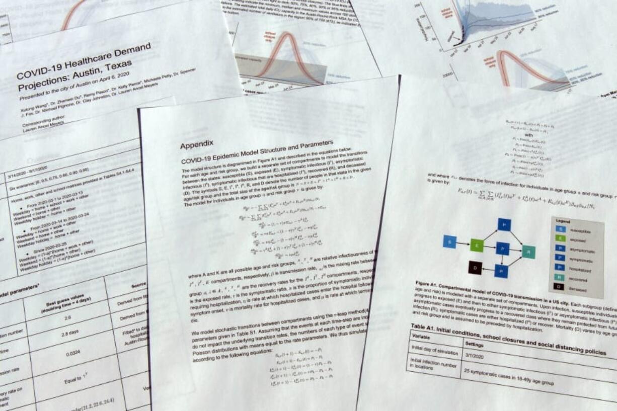 In this Monday, April 6, 2020, photo, a report delivered to the city of Austin, Texas, on COVID-19 health care demand is photographed in Frederick, Md. The latest statistical models forecast fewer deaths in the U.S. from the coronavirus pandemic before August. But there&#039;s huge uncertainty in these models because health officials are still trying to get a handle on how the virus acts, how carefully people stick with social distancing and other restrictions, and treatment of the disease.