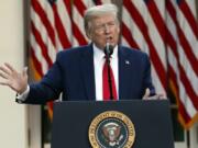 President Donald Trump speaks about the coronavirus in the Rose Garden of the White House, Monday, April 27, 2020, in Washington. Trump says states should &quot;seriously consider&quot; reopening their public schools before the end of the academic year, even though dozens already have said it would be unsafe for students to return until the summer or fall.