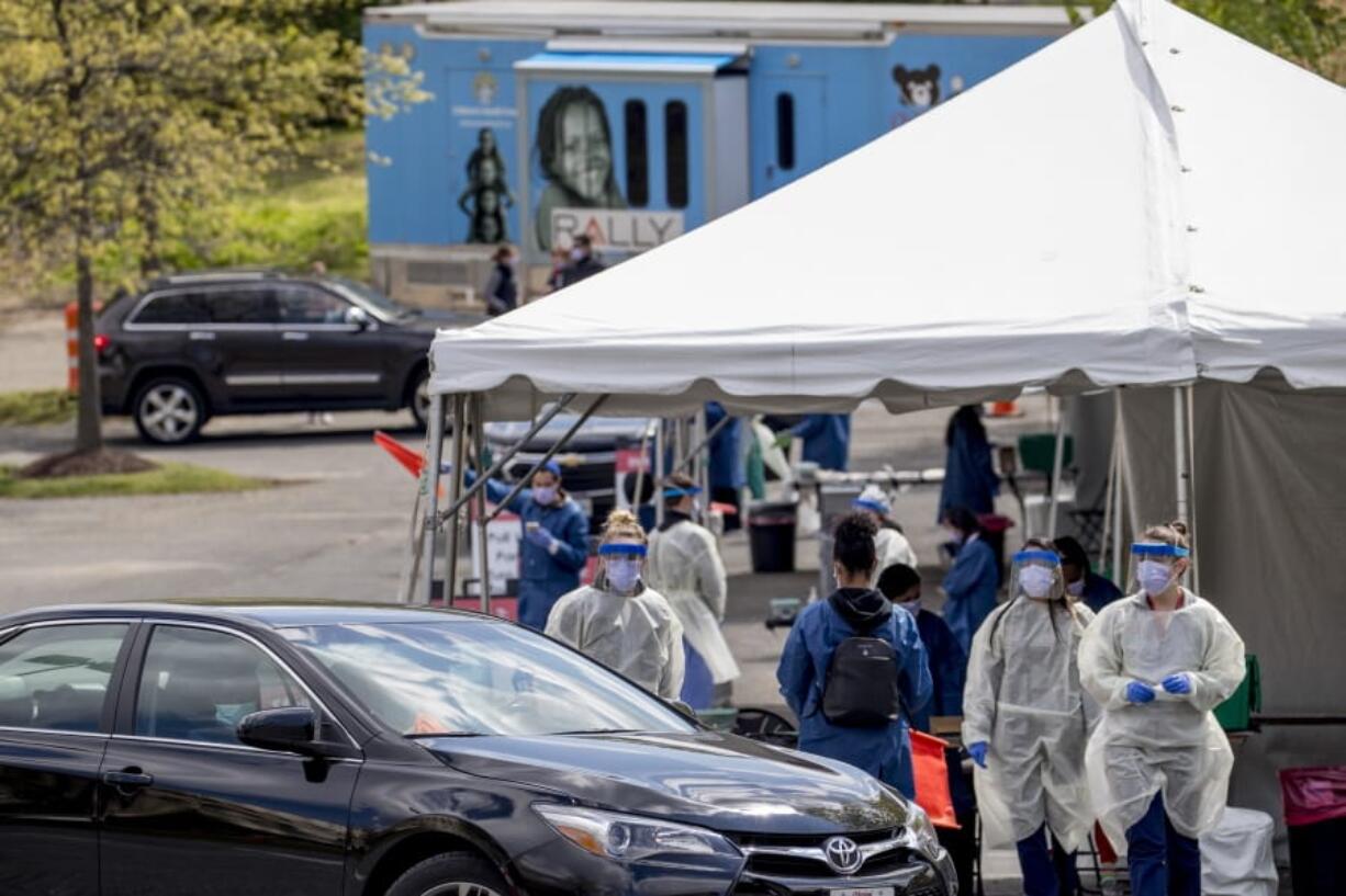 Children&#039;s National Hospital tests children and young adults for COVID-19 at a drive-through (drive-in) testing site at Trinity University, Thursday, April 16, 2020, in Washington.