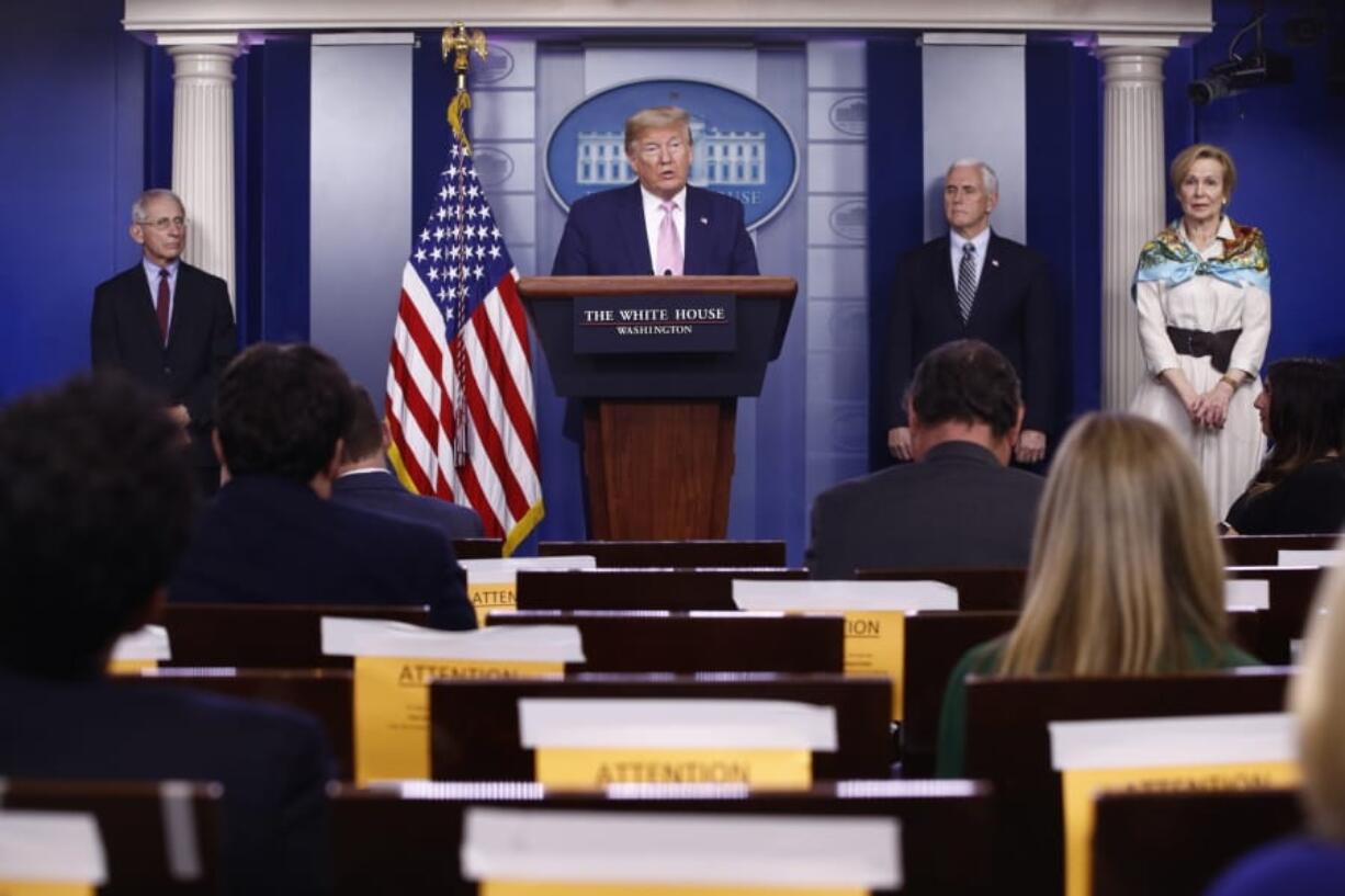 President Donald Trump speaks during a coronavirus task force briefing at the White House, Saturday, April 4, 2020, in Washington. From left, Dr. Anthony Fauci, director of the National Institute of Allergy and Infectious Diseases, Trump, Vice President Mike Pence and Dr. Deborah Birx, White House coronavirus response coordinator.