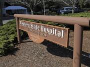 A sign near an entrance to Western State Hospital is shown Thursday, March 19, 2020, in Lakewood, Wash. (AP Photo/Ted S.