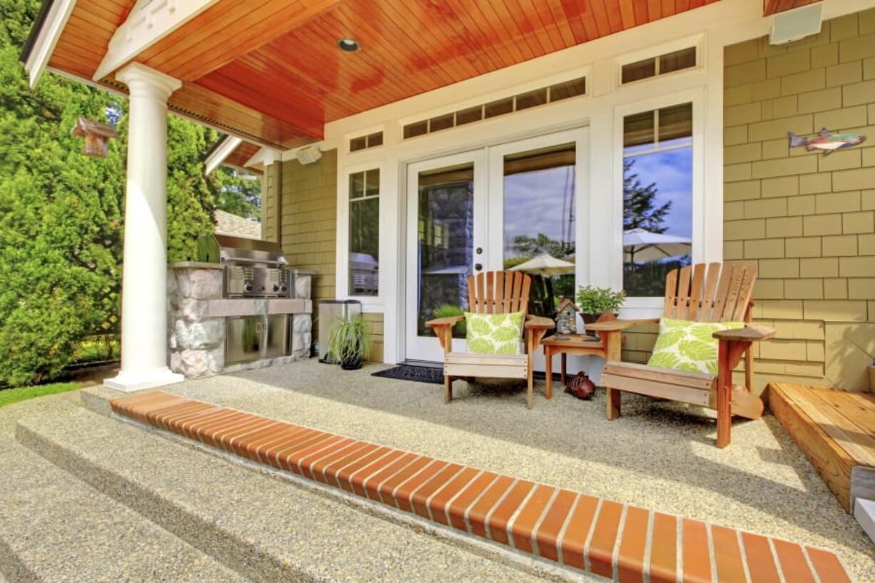 Budget-friendly upgrades such as fresh paint, area rugs and comfortable furniture can revitalize your porch.