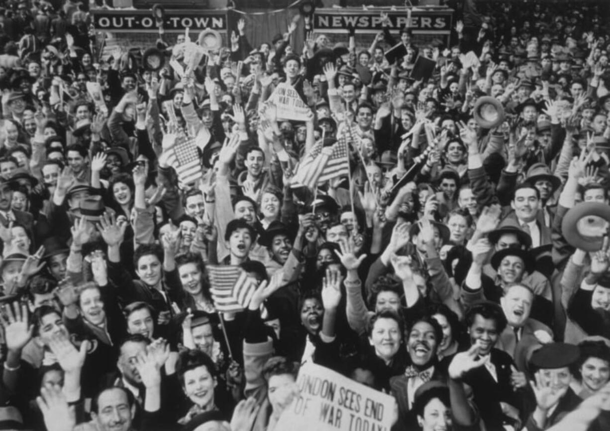 8th May 1945:  New Yorkers shout their joy at hearing reports of Germany&#039;s unconditional surrender.