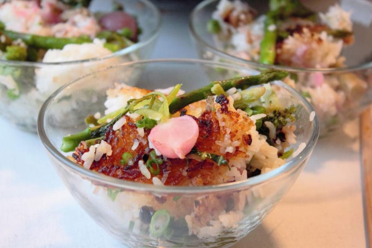 Crispy fried rice is made with leftover rice, frozen peas and window sill scallions, plus fresh spring asparagus and radishes.