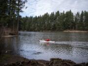 Jerry Ames of Vancouver kayaks on Lacamas Lake in Camas in December. Clark County residents fond of the open air may be headed to the water soon with Gov. Jay Inslee allowing outdoor recreation, and officials have a warning: area lakes and rivers are still frigid.