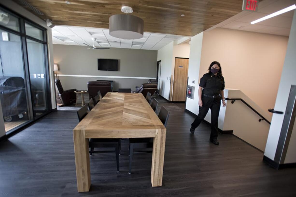 Chief Kristan Maurer walks through the dining and living area of Clark County Fire District 6&#039;s new Station 63 in Salmon Creek on Tuesday. Taxpayers voted for bonds to fund the project in 2018.