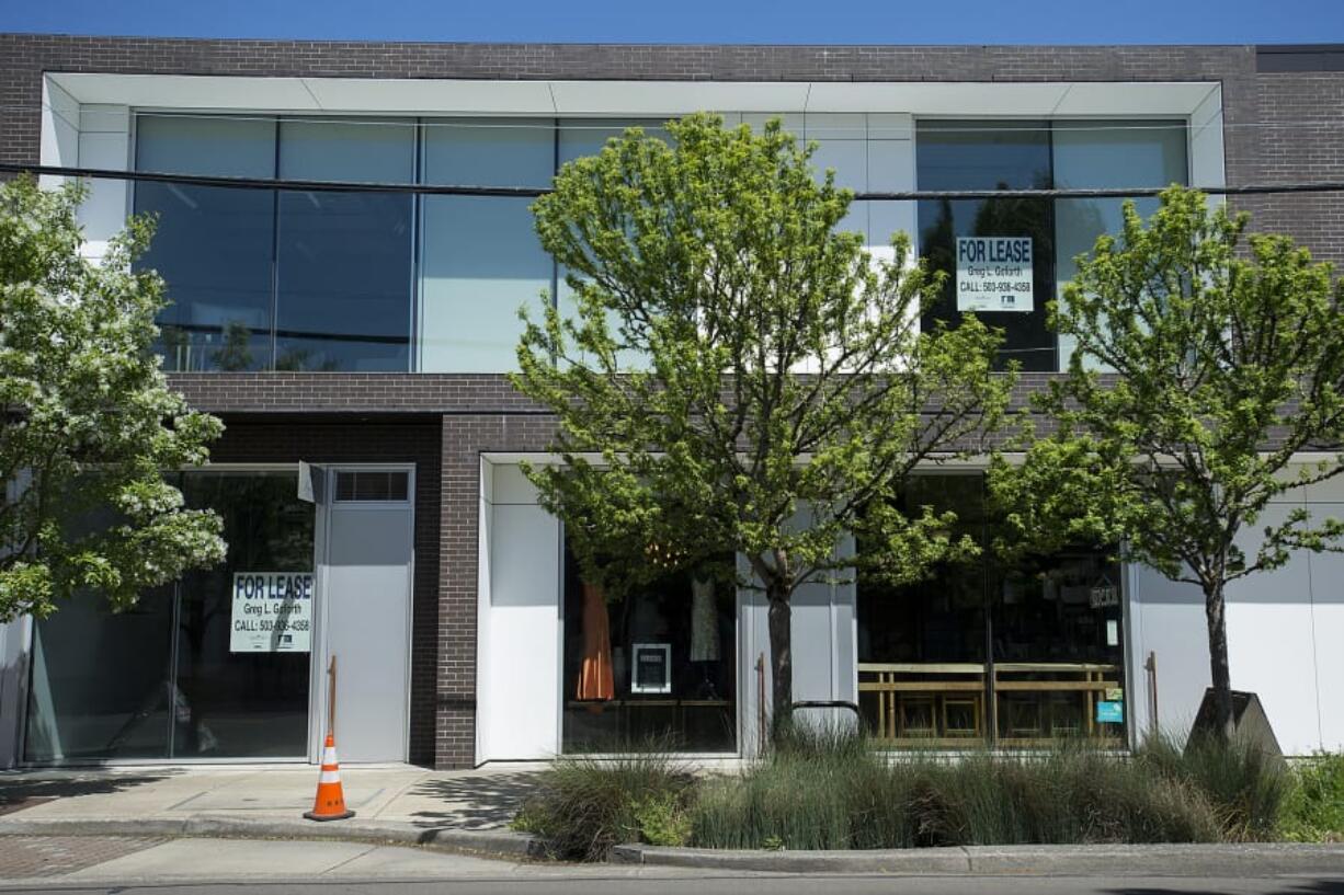 &quot;For Lease&quot; signs hang in the windows of empty commercial units in downtown Washougal.