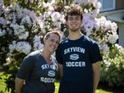 Skyview High School teacher and soccer coach Colleen McKinney and her son, senior Cody McKinney, right, are pictured at their home in Vancouver on Friday, May 8, 2020.