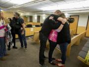 Members of Hartley Anderson&#039;s family embrace in the courtroom after the sentencing of Ryan Burge, who was convicted of murdering the 5-year-old girl, in Clark County Superior Court on Friday afternoon. Burge was sentenced to 40 years in prison. Family members are Hartley&#039;s grandmother Carla Luchau, father Peter Anderson, grandfather Tim Luchau, uncle T.J. Luchau, mother Nataasha Tafoya and aunt Whitney Nailon.