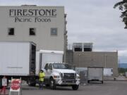 Work continues at Firestone Pacific Foods along Fruit Valley Road, after 69 employees of the plant tested positive for COVID-19. The facility has been allowed to continue some its production. There are 69 confirmed cases in facility employees and 15 confirmed cases in close contacts of those employees.