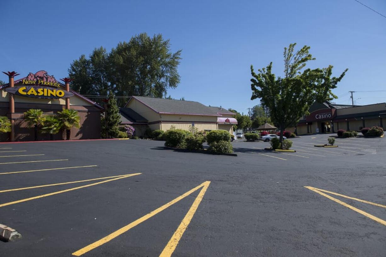 A nearly empty parking lot is seen Wednesday morning outside La Center casinos after concerns about COVID-19 led to their temporary closure. One of the casinos, New Phoenix, had already closed years earlier.