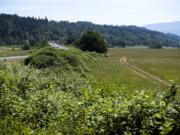 Construction at Steigerwald Lake National Wildlife Refuge, seen Friday, will include raising state Highway 14.