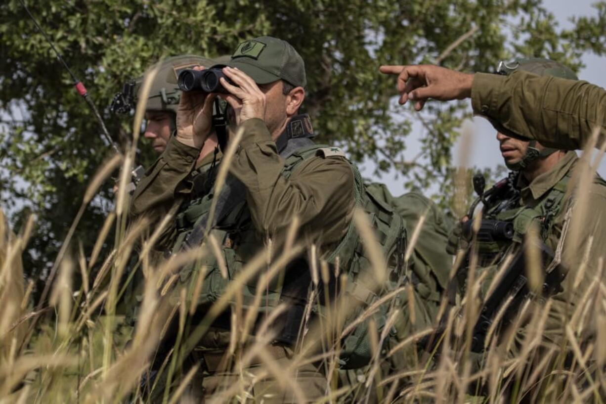 In this Wednesday, May 13, 2020 photo, Israeli troops take part in a drill in northern Israel. Twenty years after Hezbollah guerrillas pushed Israel&#039;s last troops from southern Lebanon, both sides are gearing up for a war that neither seems to want. Israeli troops are drilling for a possible invasion of Lebanon and striking Hezbollah targets in neighboring Syria. Hezbollah is beefing up its own forces and threatening to invade Israel.