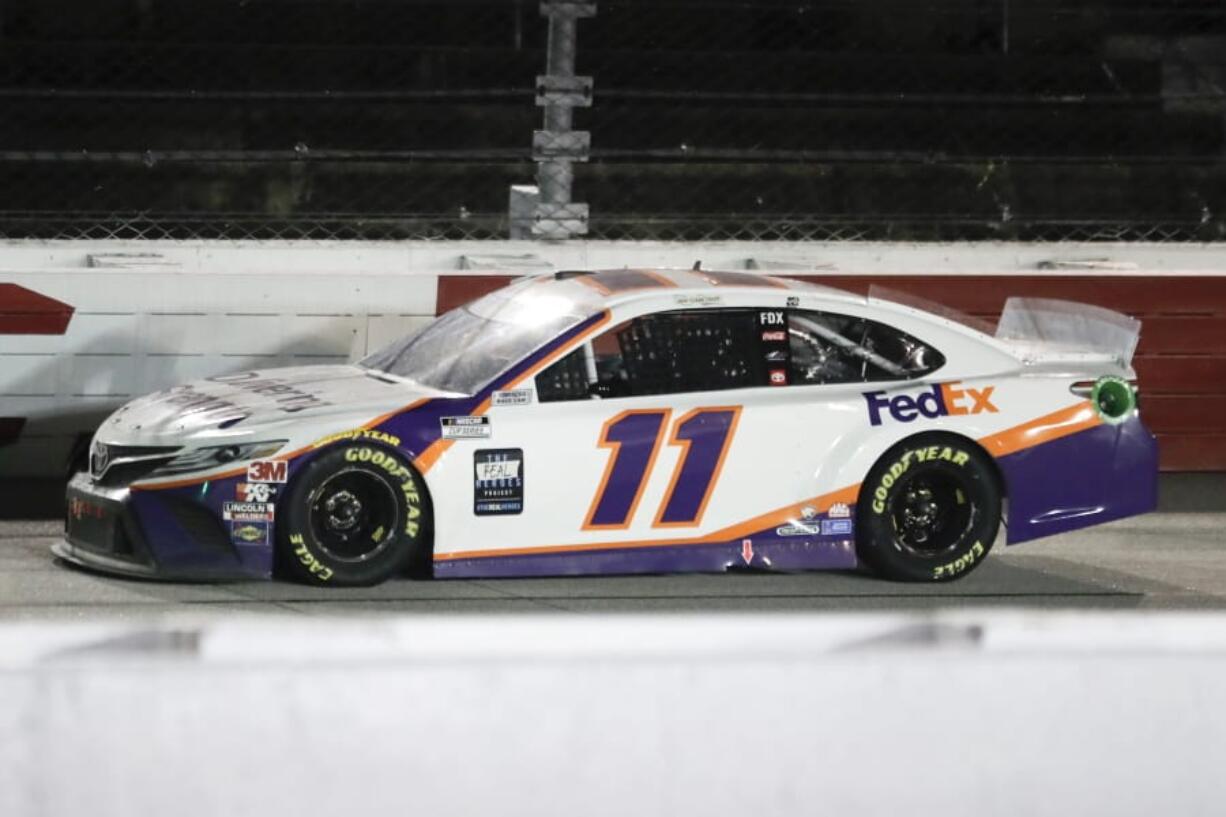 Denny Hamlin (11) drives during the NASCAR Cup Series auto race Wednesday, May 20, 2020, in Darlington, S.C. Hamlin won the race shortened by rain.