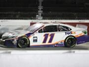 Denny Hamlin (11) drives during the NASCAR Cup Series auto race Wednesday, May 20, 2020, in Darlington, S.C. Hamlin won the race shortened by rain.