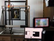 A macro XRF scanner is used Feb. 26 to study in minute detail the surface of Johannes Vermeer&#039;s 17th century masterpiece &quot;Girl With a Pearl Earring,&quot; at the Mauritshuis museum in The Hague, Netherlands.