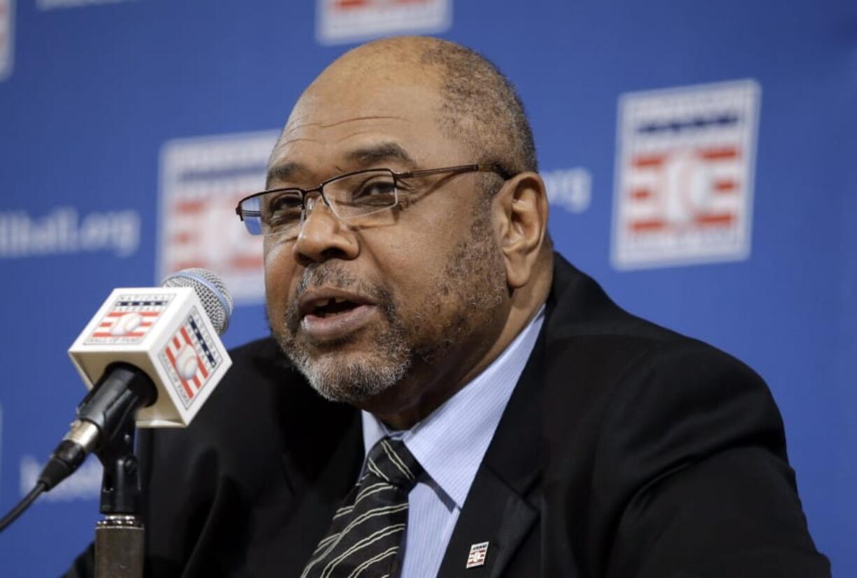 FILE - In this Dec. 3, 2012, file photo, Bob Watson talks about the selections made to the Baseball Hall of Fame by the pre-integration era committee, at the baseball winter meetings in Nashville, Tenn. Watson, a two-time All-Star as a player who later became the first African American general manager to win a World Series with the Yankees in 1996, has died. He was 74.