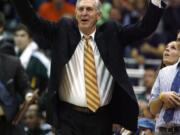 FILE - This Nov. 26, 2010, file photo shows Utah Jazz head coach Jerry Sloan protesting a call by officials during the first half of an NBA basketball game against the Los Angeles Lakers in Salt Lake City. The Utah Jazz have announced that Jerry Sloan, the coach who took them to the NBA Finals in 1997 and 1998 on his way to a spot in the Basketball Hall of Fame, has died. Sloan died Friday morning, May 22, 2020, the Jazz said, from complications related to Parkinson&#039;Aos disease and Lewy body dementia. He was 78. (AP Photo/Steve C.