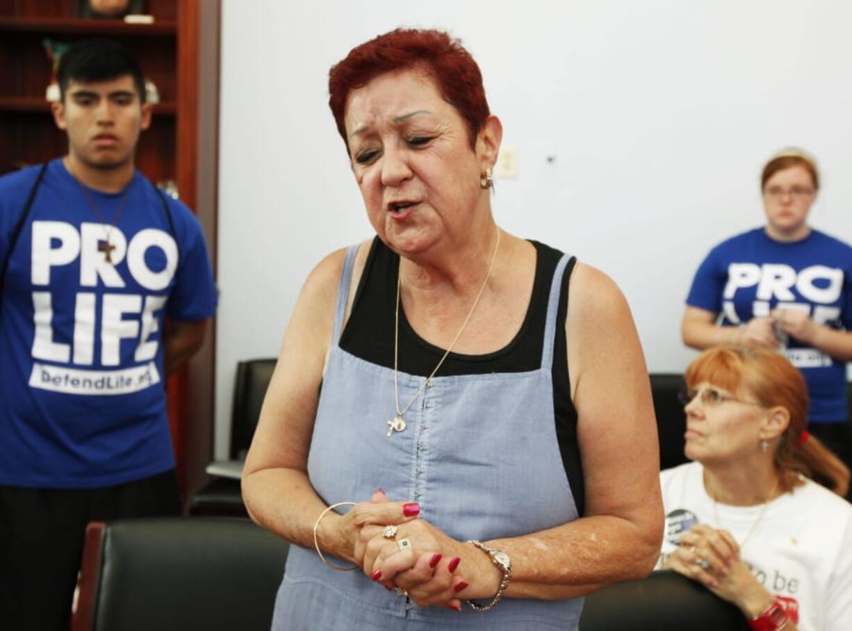 FILE - In this July 28, 2009 file photo, Norma McCorvey, the plaintiff in the landmark lawsuit Roe v. Wade, speaks as she joins other anti-abortion demonstrators inside House Speaker Nancy Pelosi&#039;s office on Capitol Hill in Washington. In a 2020 documentary, she admitted she was paid by anti-abortion activists for her inauthentic conversion.