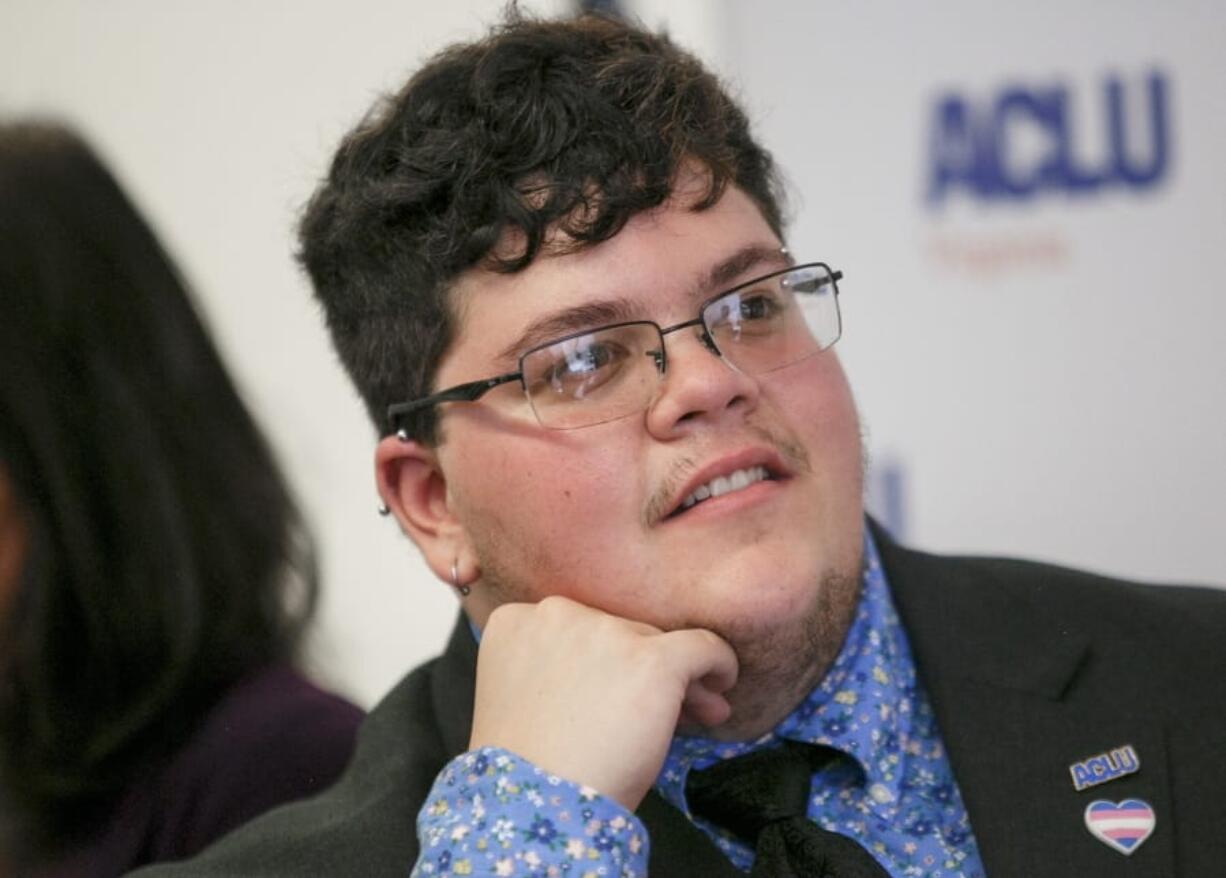 FILE - In this July 23, 2019, file photo, Gavin Grimm, who has become a national face for transgender students, speaks during a news conference held by The ACLU and the ACLU of Virginia at Slover Library in Norfolk, Va. A federal appeals court is hearing arguments Tuesday, May 26, 2020, in the case of Grimm who sued a Virginia school board after he was barred as a student from using the boys&#039; bathrooms at his high school. A judge ruled last year that the Gloucester County School Board had discriminated against Grimm.