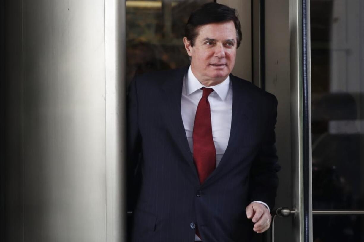 FILE- In this Nov. 6, 2017 file photo, Paul Manafort, President Donald Trump&#039;s former campaign chairman, leaves the federal courthouse in Washington. Manafort has been released from federal prison to serve the rest of his sentence in home confinement over concerns about the coronavirus, his lawyer said Wednesday.