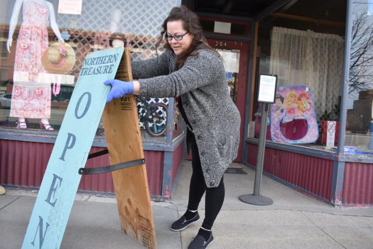 Nicole Snider opens the Northern Treasure thrift store on Monday, April 27, 2020 in Roundup, Mont. The store had been closed for a month under a coronavirus directive from the state&#039;s governor.