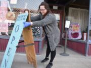 Nicole Snider opens the Northern Treasure thrift store on Monday, April 27, 2020 in Roundup, Mont. The store had been closed for a month under a coronavirus directive from the state&#039;s governor.