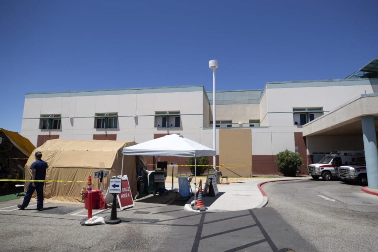 A tent sits in front of the El Centro Regional Medical Center to help process patients with symptoms related to the new coronavirus Wednesday, May 20, 2020, in El Centro, Calif. As much of California inches toward businesses reopening, this farming region on the state&#039;s border with Mexico is grappling with a spike in hospitalizations from the coronavirus that could inflict more pain on its perpetually struggling economy.