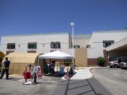 A tent sits in front of the El Centro Regional Medical Center to help process patients with symptoms related to the new coronavirus Wednesday, May 20, 2020, in El Centro, Calif. As much of California inches toward businesses reopening, this farming region on the state&#039;s border with Mexico is grappling with a spike in hospitalizations from the coronavirus that could inflict more pain on its perpetually struggling economy.