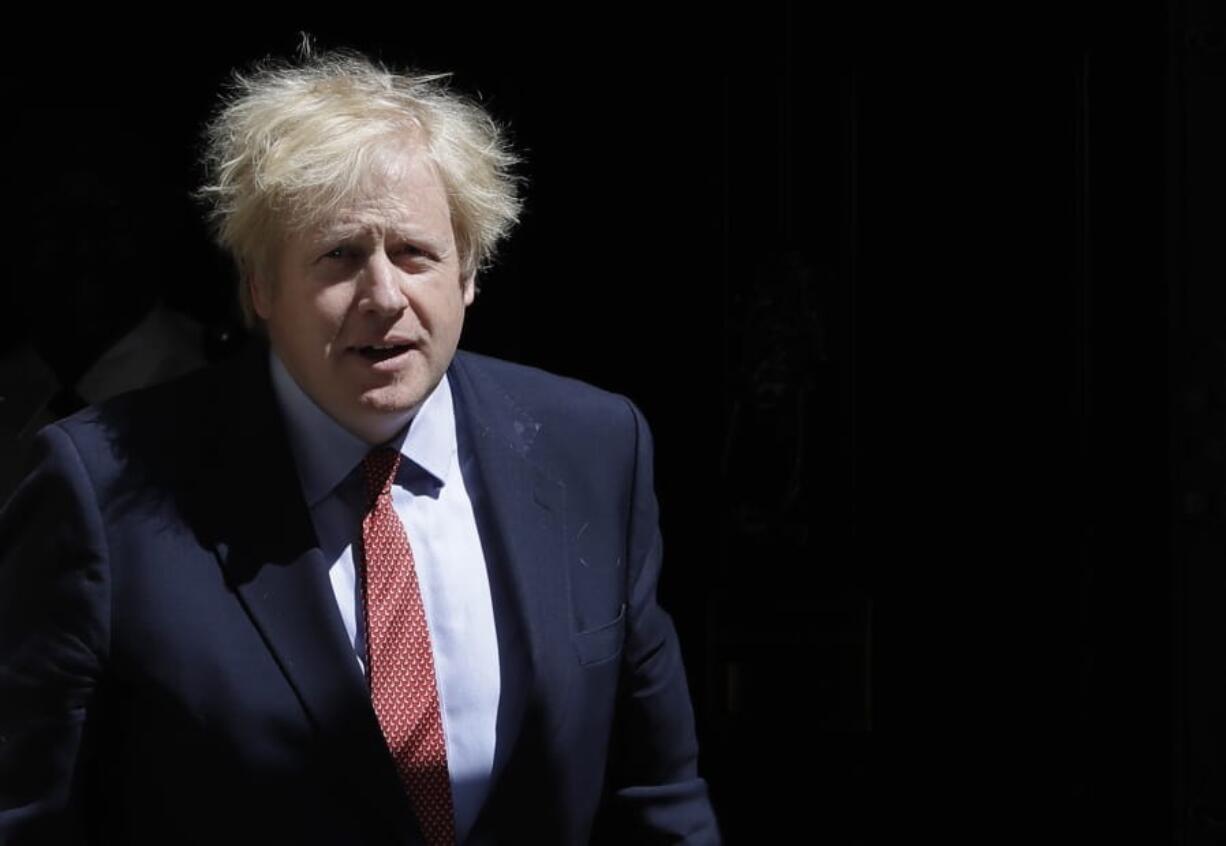 Britain&#039;s Prime Minister Boris Johnson leaves Downing Street to attend the weekly session of PMQs in Parliament in London as the country continues its lockdown to help stop the spread of coronavirus, Wednesday, May 20, 2020.