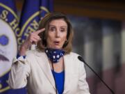 In this April 30, 2020, photo, House Speaker Nancy Pelosi of Calif. speaks during a news conference on Capitol Hill in Washington. House Democrats are seeking to drive the debate on the next coronavirus response bill. They&#039;re promising a mega-package stuffed with Democratic priorities, including funding for state and local governments.