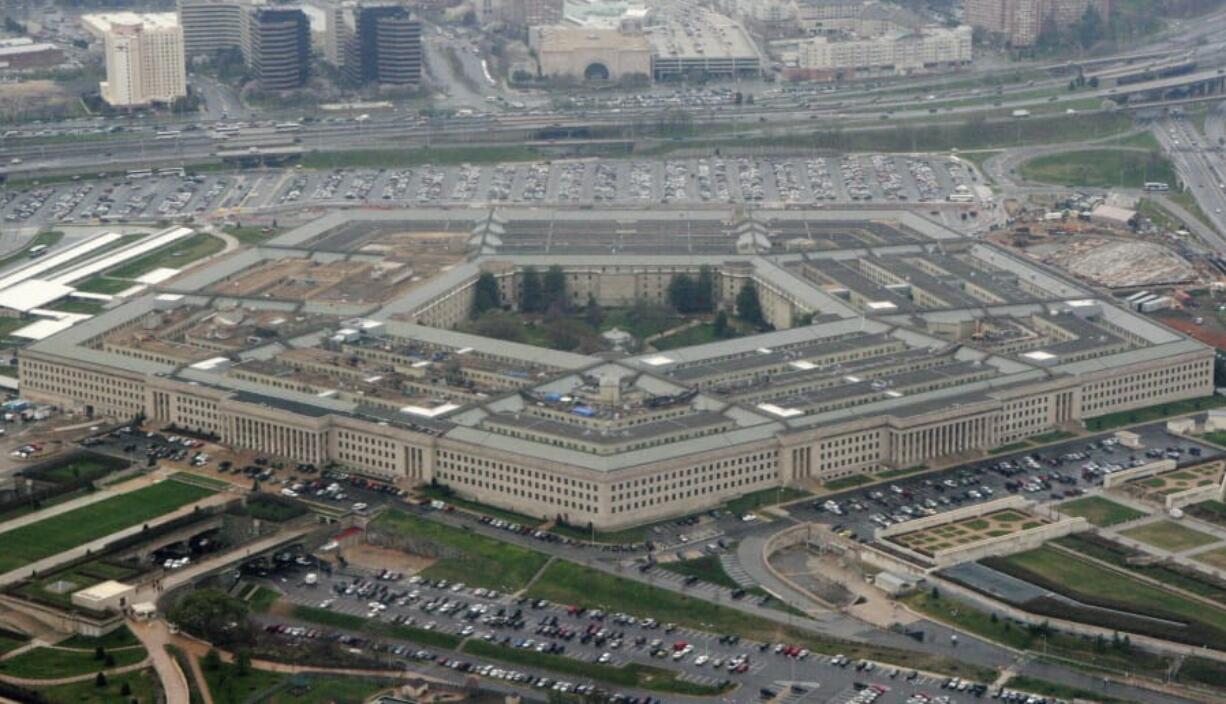 FILE - This March 27, 2008 file photo shows the Pentagon in Washington.  New Defense Department guidelines say that anyone who has been hospitalized for the coronavirus won&#039;t be allowed to enlist in the military unless they get a special medical waiver.