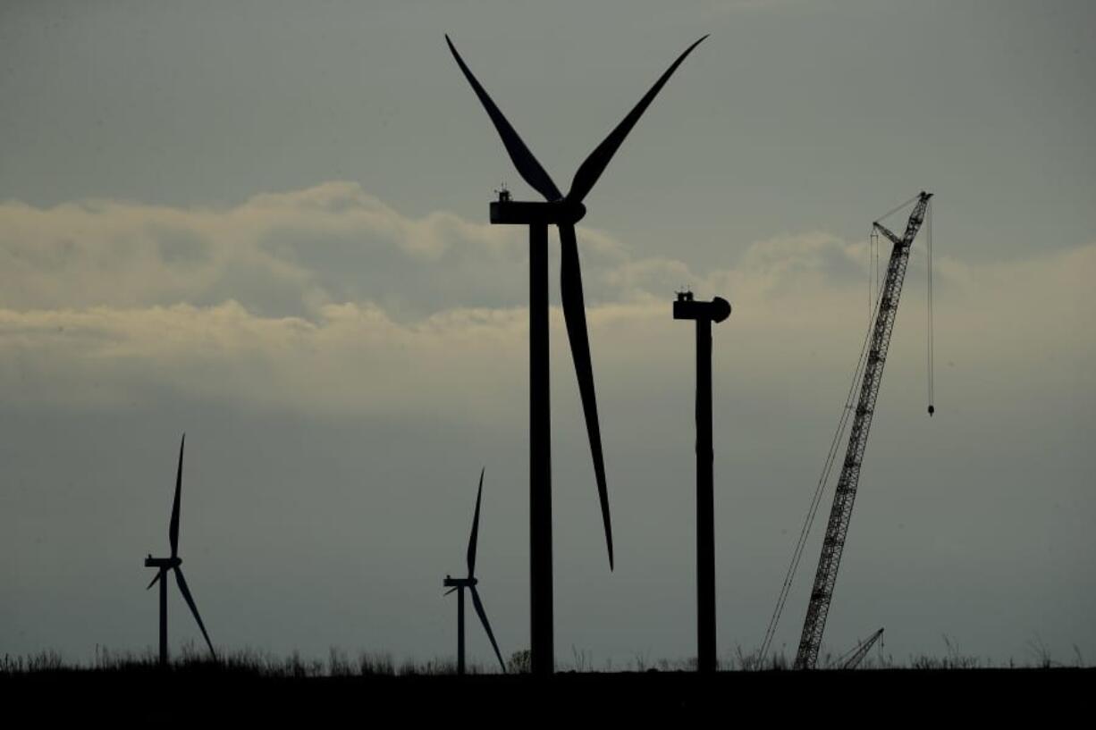 Wind turbines stand in various stages of completion at the Reading Wind Facility on April 23 in Reading, Kan.