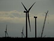 Wind turbines stand in various stages of completion at the Reading Wind Facility on April 23 in Reading, Kan.