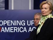 FILE - In this April 16, 2020, file photo, Dr. Anthony Fauci, director of the National Institute of Allergy and Infectious Diseases, and Dr. Deborah Birx, White House coronavirus response coordinator, listen during a briefing about the coronavirus in the James Brady Press Briefing Room of the White House in Washington. The Trump administration has shelved a set of detailed documents created by the nation&#039;s top disease investigators meant to give step-by-step advice to local leaders deciding when and how to reopen mass transit, day care centers, restaurants, bars and other public places during the still-raging pandemic.