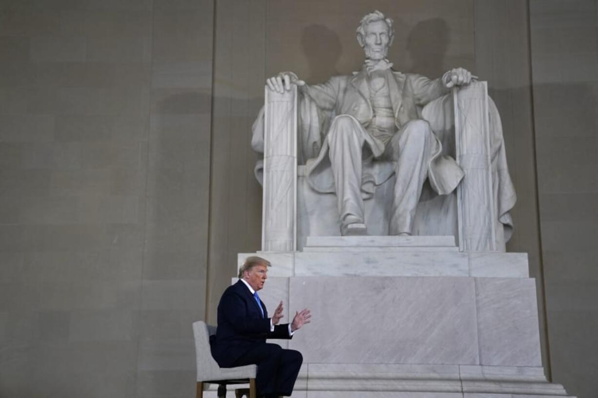 President Donald Trump speaks during a Fox News virtual town hall from the Lincoln Memorial, Sunday, May 3, 2020, in Washington.