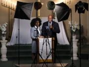 The Rev. Craig Robinson and his wife, associate pastor Dr. Shakira Sanchez-Collins, film their Sunday service at St. James AME Church in Chicago on May 7, 2020.