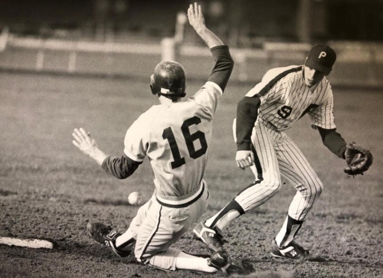 Prairie&#039;s Ryan Issacson fields a throw as Columbia River&#039;s Matt Grammer slides into second base during a game on April 1, 1989. Prairie, which won that game 2-0, would go on to claim the AA state championship that year.