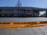 Caution tape surrounds one side of the Motel 6 at 221 Northeast Chkalov Dr. in April. The site is now being used as a homeless shelter and quarantine site.