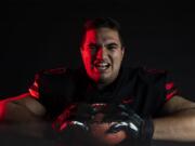 Camas senior Tai Tumanuvao poses for a press photo in The Columbian studio on Wednesday afternoon, Dec. 13, 2019.