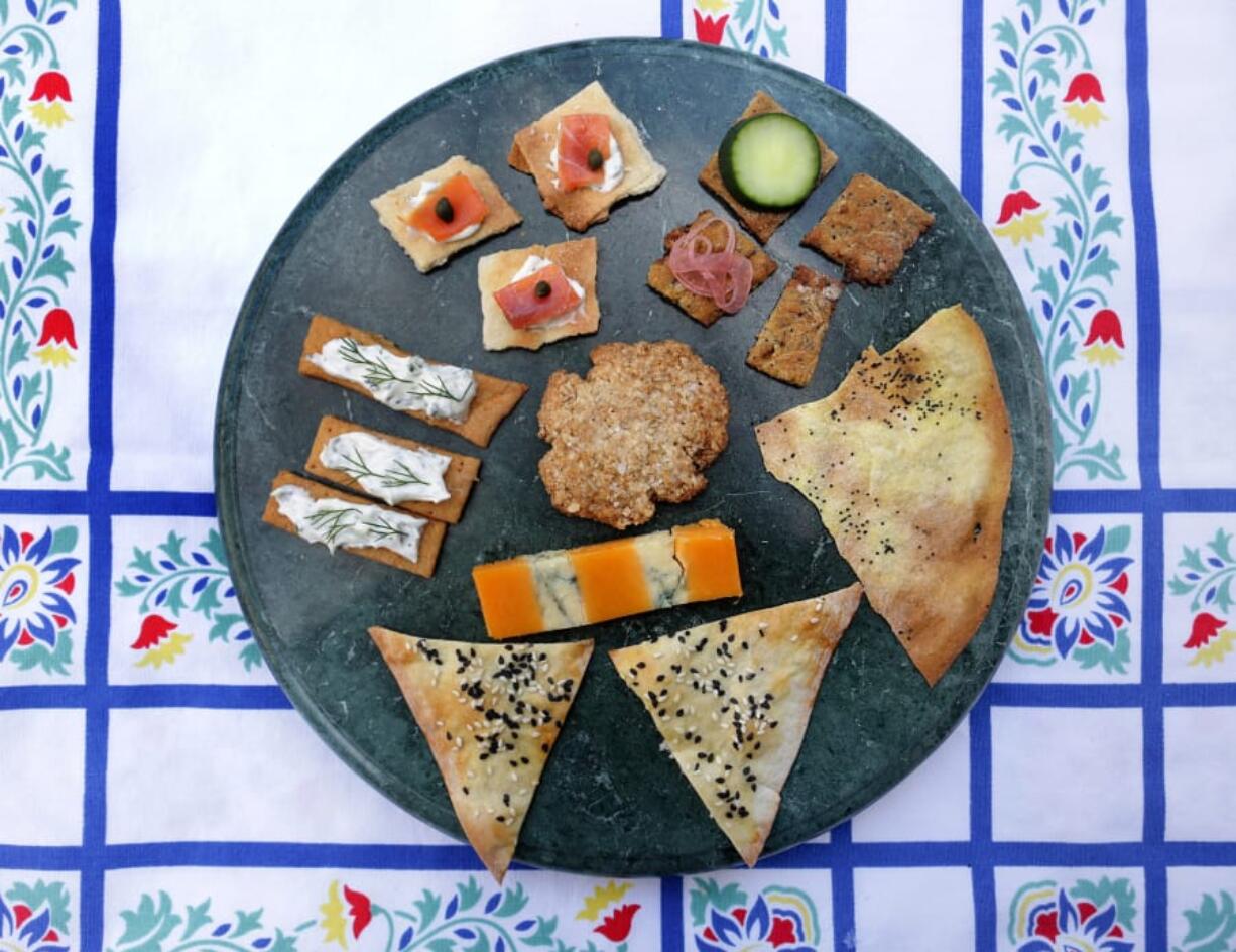 Homemade crackers can be served with an assortment of toppings. (Hillary Levin/St.