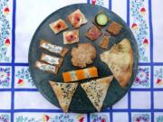 Homemade crackers can be served with an assortment of toppings. (Hillary Levin/St.