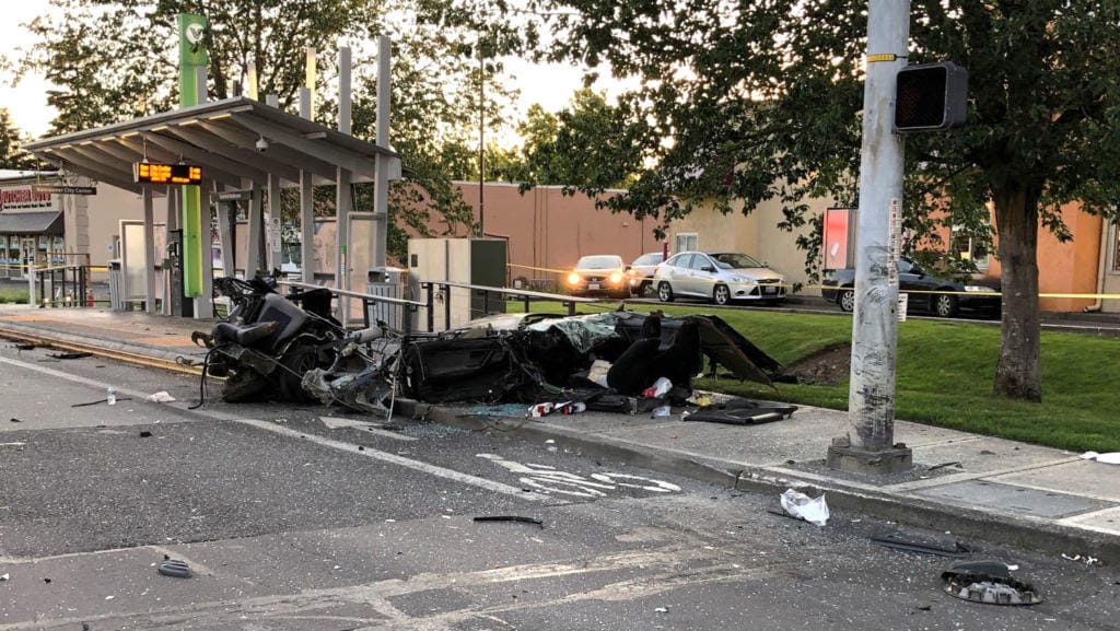 Vancouver police are investigating a Thursday night injury crash in which one of the involved cars was ripped in half when it struck a light pole.