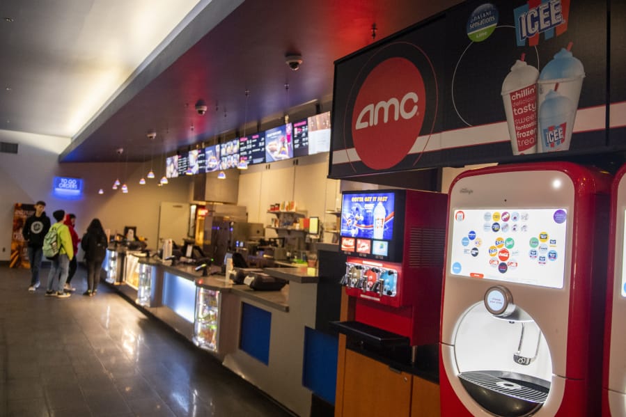 Customers pick up concessions at AMC Vancouver Mall 23. All theaters in Clark County have been shuttered for months due to COVID-19, but Clark County may soon move to Phase 3 of the state&#039;s reopening plan, which will allow for theaters to resume operations with seating capacity limits.