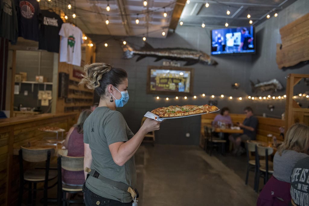 In Phase 2, restaurants in Clark County can open indoor dining but servers must wear masks.